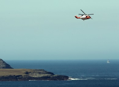 An Irish Coastguard helicopter searching along the coastline near Blacksod, Co Mayo, earlier this year.