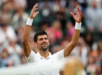Djokovic celebrates victory on Centre Court.