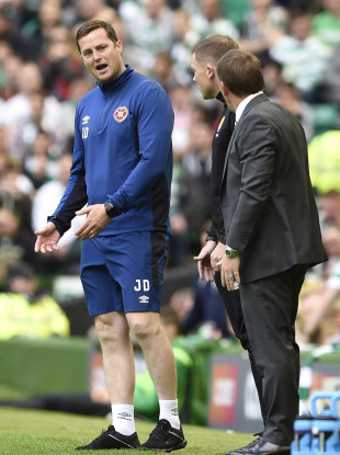 Daly and Rodgers on the touchline earlier.