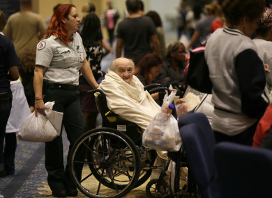 Evacuee Teddy Gifford, 90, waits for a medical evaluation at a Texas church.