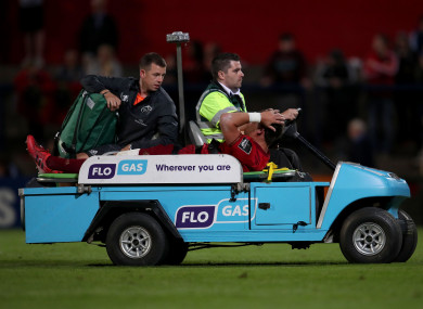 Goggin received treatment on the pitch before being carted off.