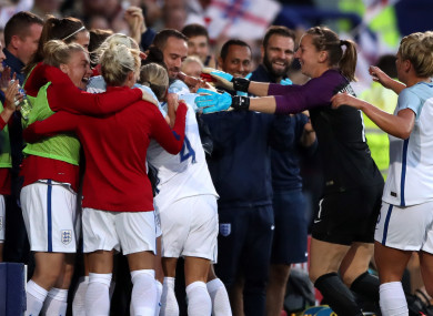 England's Nikita Parris and her team-mates celebrate their side's first goal of the game with manager Mark Sampson.