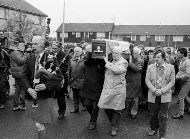 A piper leads the funeral procession from Patrick Kelly's home on the Lisnahull Estate in Dungannon .