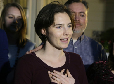 Amanda Knox talks to members of the media outside her mother's home, Friday, March 27, 2015, in Seattle.