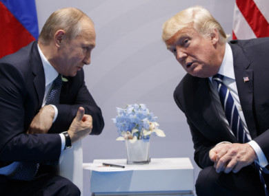 File photo of Vladimir Putin and Donald Trump.