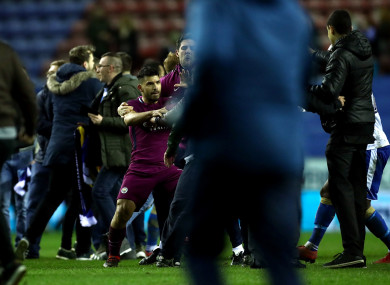 Aguero is confronted after the final whistle.