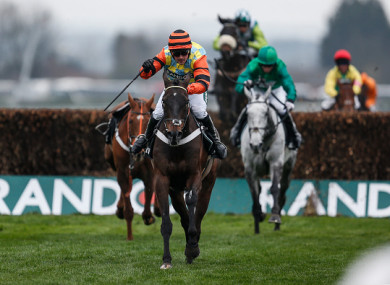 Jockey Nico de Boinville rides Might Bite home in the Betway Bowl.