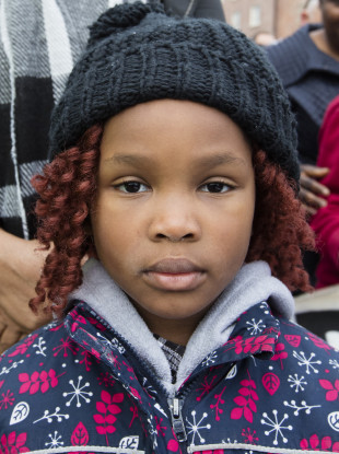 Yvonne Tshala, six, who has been living in a Direct Provision centre in Cork with her mother for over three years, pictured at a demonstration calling for the end of DP (November 2017)