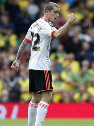 Kavanagh celebrates scoring a goal for Fulham at Craven Cottage in 2014.