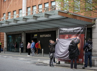 People block the ICBR posters outside the Rotunda Hospital