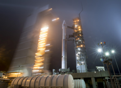 In this photo released by NASA, the mobile service tower at SLC-3 is rolled back to reveal the United Launch Alliance (ULA) Atlas-V rocket with NASA's InSight spacecraft onboard.