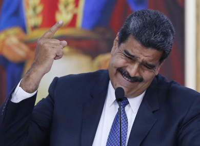 President Nicolas Maduro speaks during a meeting with international observers.