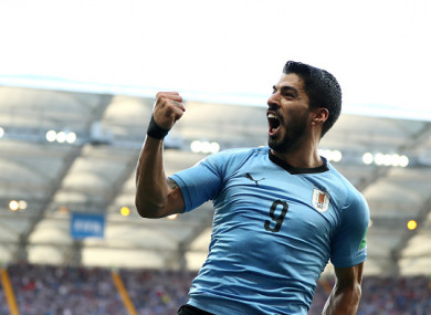 Suarez celebrates giving Uruguay the lead at the Rostov Arena on Wednesday.
