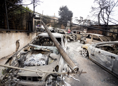 Burnt cars in the town of Mati