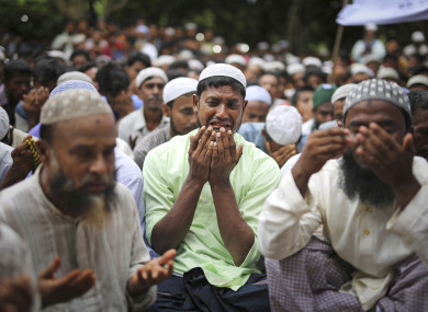 Thousands of Rohingya Muslim refugees on Saturday marked the one-year anniversary of the attacks that sent them fleeing to safety in Bangladesh, praying they can return to their homes in Myanmar and demanding justice for their dead relatives and neighbors.