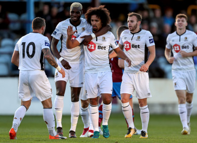 Waterford players celebrate after Bastien Hery's goal.