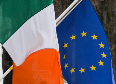 Irish and EU flags side-by-side in Dublin.