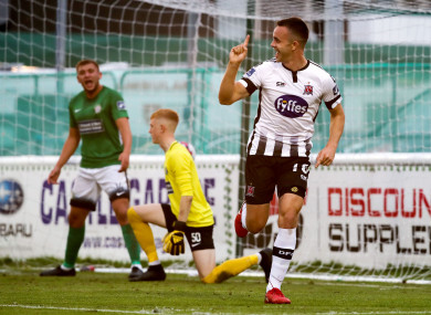 Robbie Benson reels away in celebration at the Carlisle Grounds.