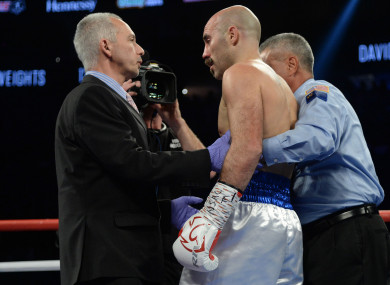 Gary O'Sullivan is stopped by referee Russel Mora during his middleweight boxing match against David Lemieux.