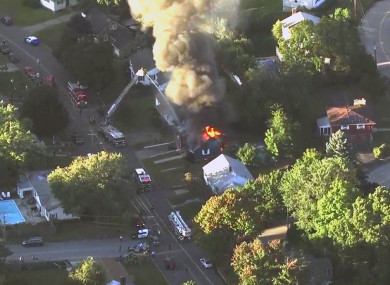 Firefighters battle a raging house fire in Lawrence, Massachusetts, a suburb of Boston.