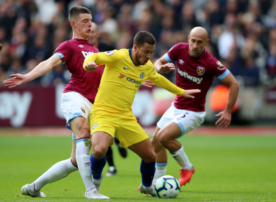 Declan Rice challenges Eden Hazard.