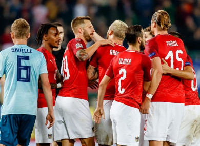 Austria celebrate their winning goal.