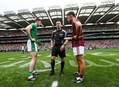 James Owens with the captains before throw-in.