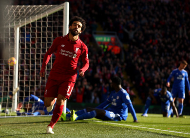 Mo Salah celebrates scoring.
