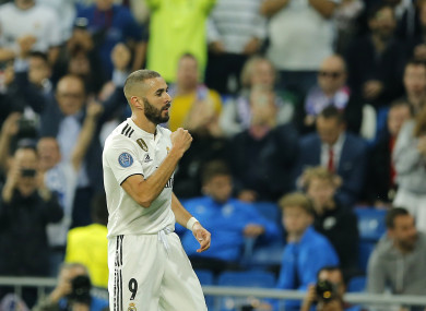 Karim Benzema celebrates scoring a goal.