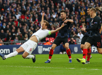 Harry Kane stretches out to score against Croatia at Wembley.