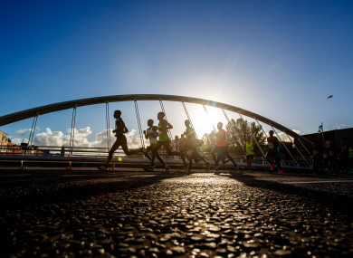 Runners cross over James Joyce bridge in the 2018 SSE Airtricity Dublin Marathon.