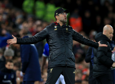 Jurgen Klopp entered the pitch to celebrate Liverpool's late winner with goalkeeper Alisson.