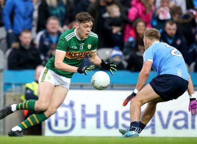 David Clifford takes on Jonny Cooper during the 2018 league meeting between Kerry and Dublin.