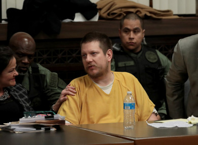Former Chicago police officer Jason Van Dyke reacts with attorneys Tammy Wendt, left, and Daniel Herbert at Van Dyke's sentencing hearing.