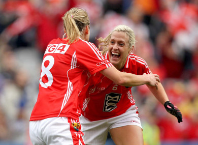 Brid Stack celebrates at the final whistle of the 2011 All-Ireland Ladies Senior football final with Cork team-mate Juliet Murphy.