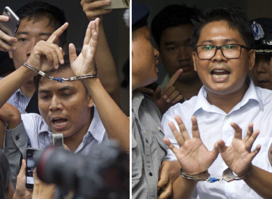 euters journalists Kyaw Soe Oo, left, and Wa Lone, are handcuffed as they are escorted by police out of the court last September.