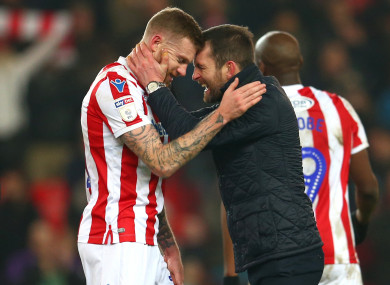 Stoke City manager Nathan Jones (right) celebrates at full time with James McClean.