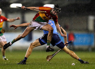 Ted Joyce and Chris Crummey clash for possession.