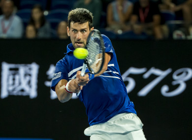 Novak Djokovic in action against Daniil Medvedev at the Australian Open today.