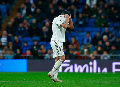 Real Madrid's Lucas Vazquez reacts to being sent off.