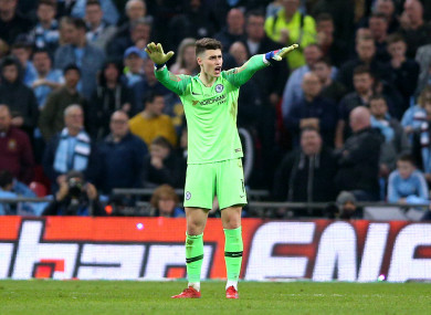 Kepa gestures to Sarri to say he wants to continue.