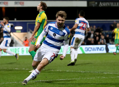 Luke Freeman celebrates giving QPR the lead on Tuesday night.