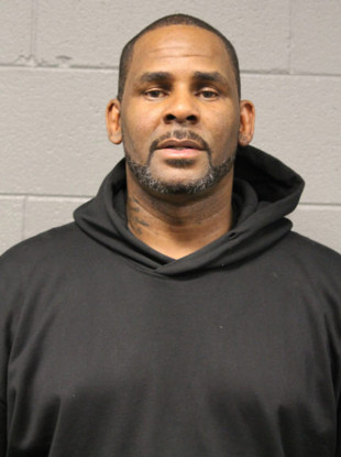 R Kelly photographed at a police station in Chicago
