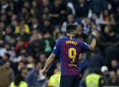 Luis Suarez celebrates Barca's third goal.