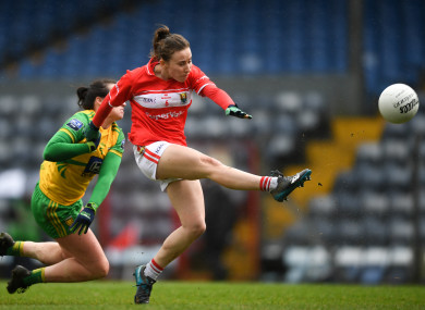 Cork's Melissa Duggan is tackled by Treasa Doherty of Donegal.