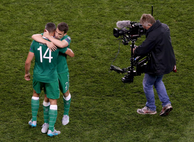 Jon Walters and Seamus Coleman embrace after a Euro 2016 qualifier against Georgia.