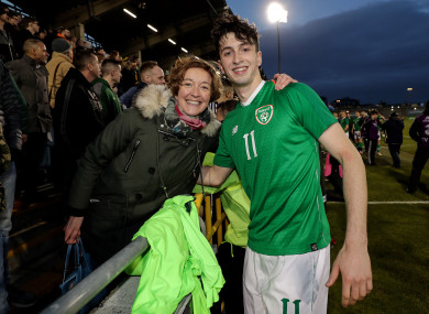 Ireland's Neil Farrugia celebrates with his mother, Mary Farugia, after the U21 game.