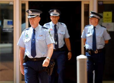 NSW Police Superintendent Brett McFadden (centre) arrives to address media at a press conference at Penrith Police Station.