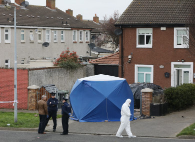 Gardai and Garda Forensics investigating a fatal shooting which occurred in the front garden of a house at Foxdene Avenue.