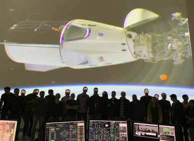 The SpaceX team in Hawthorne, California watches as the SpaceX Crew Dragon docks with the International Space Station’s Harmony module.